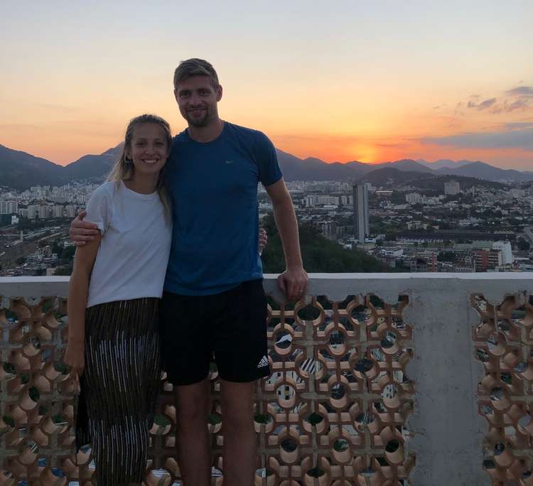 Joel and Natasha on the roof of a community centre overlooking Rio (Picture credit: Joel Glover)