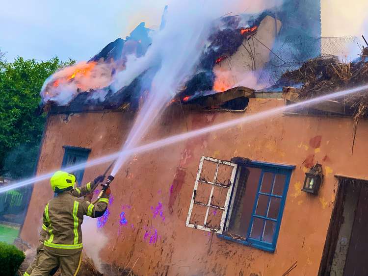 Thatch alight (Picture credit: Suffolk fire and rescue service)