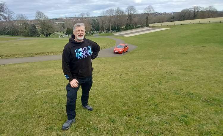 Gordon McLeod with his adopted Hadleigh in the backdrop (Picture credit: Hadleigh Nub News)