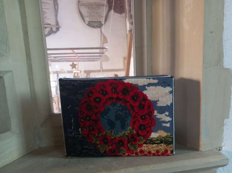 Kersey church poppy cushion