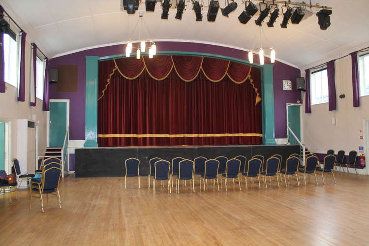 It boasts a large auditorium with stage and balcony