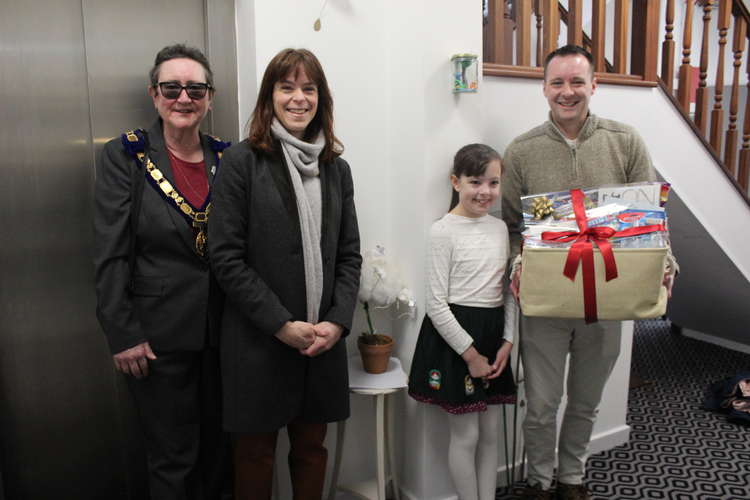 Prizewinner Ruby Hammett with her father, mayor Jill Farrow and organiser Kate Ridout