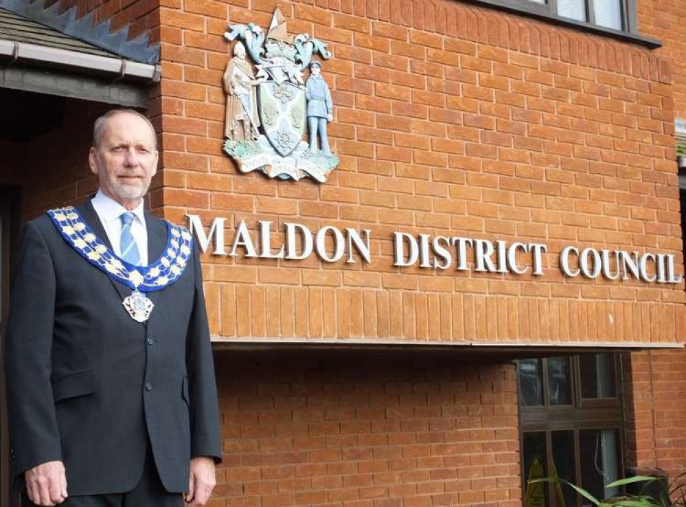 Councillor Mark Heard and officer Les Davis with the special flag (Credit: Maldon District Council)