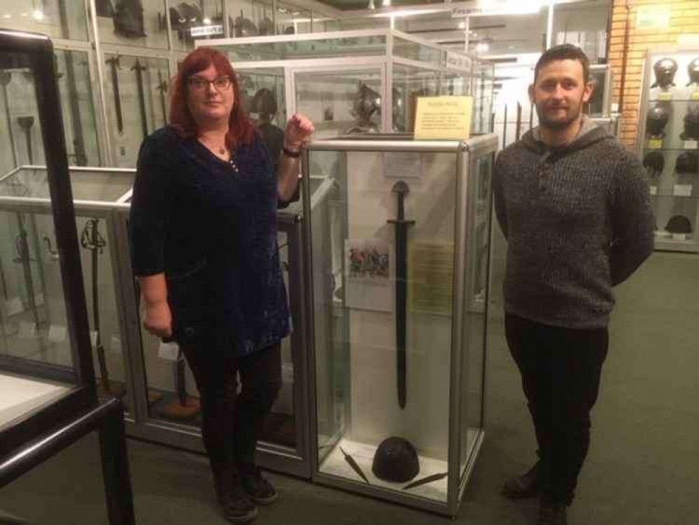 Curator Julie Miller and technician Kyle Monk with a Viking sword at the Combined Military Services Museum in Maldon