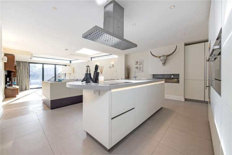 The property boasts a spacious open-plan kitchen family room (Image: Rampton Baseley)