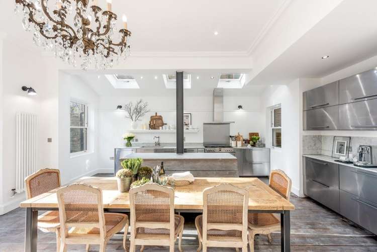 At the rear of the ground floor is a magnificent open plan kitchen and dining area (Image: John D Wood)