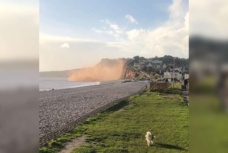 Dust clouds following the cliff fall at Budleigh Salterton (Credit: Mark Vinnicombe)