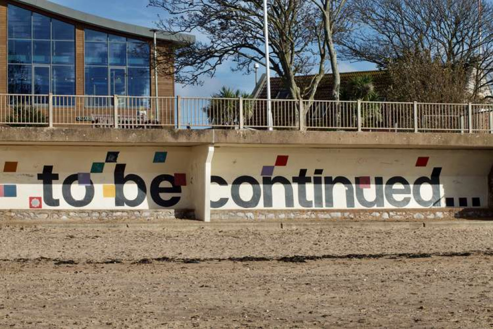 The 'abode of love' section of the sea wall on Exmouth beach (Nub News, Will Goddard)