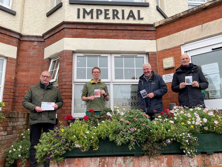 L to R: Cllr Fred Caygill, Dr Tom Wright, Cllr Geoff Jung, Cllr Tony Woodward pictured holding the new guides (EDDC)