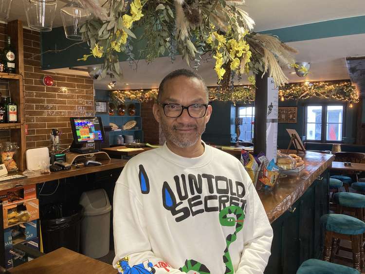 Ray Ribeiro at the bar inside The Globe Inn, Lympstone (Nub News, Will Goddard)