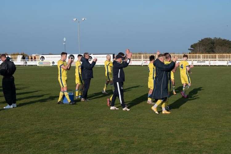 Town players clapping faithful supporters who made the 260-mile round trip to Mousehole (Simon Reeves)