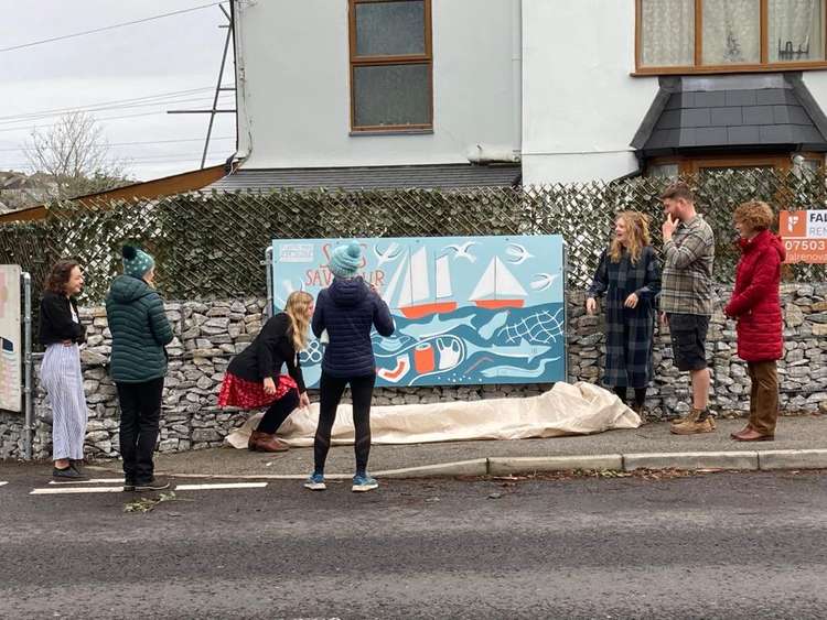 The unveiling of the mural.