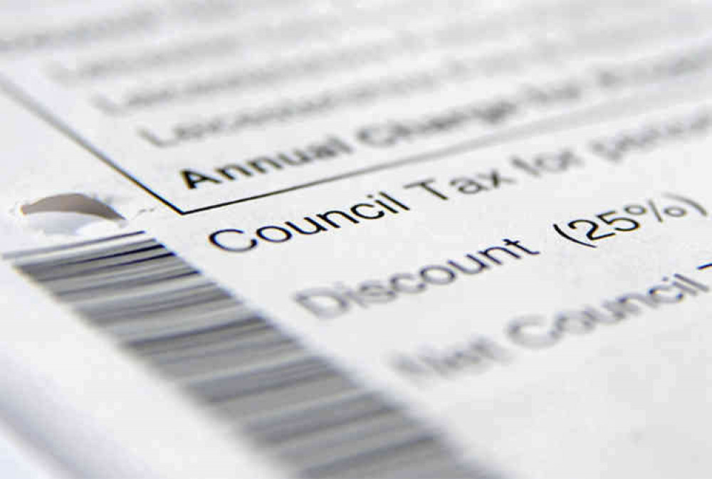 A council tax rise and job cuts are planned in the budget.