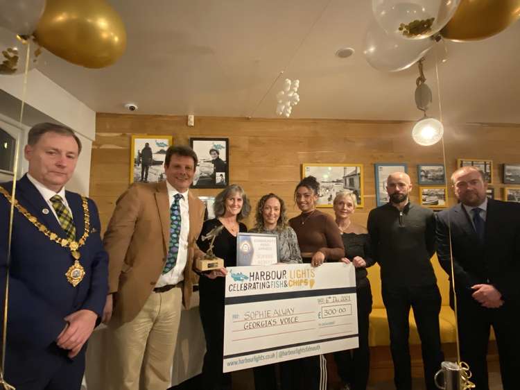 Winner Sophie Alway (Georgia's Voice), with Mayor Steve Eva, Harbour Lights Pete Fraser, and Town Manager Richard Gates, with family members.