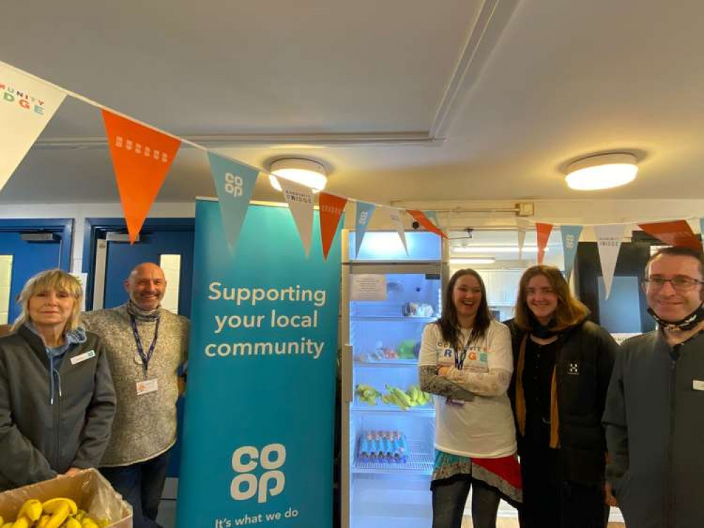 Co-op Member Pioneer Lesley Perkins with representatives of The Dracaena Centre, and Clipper Way store manager Simon Berryman.