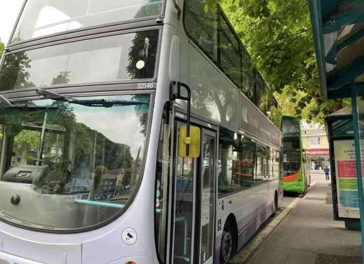 Passengers will be able to hop on and hop off with the same ticket on buses across Cornwall. Bus waiting on The Moor, Falmouth.