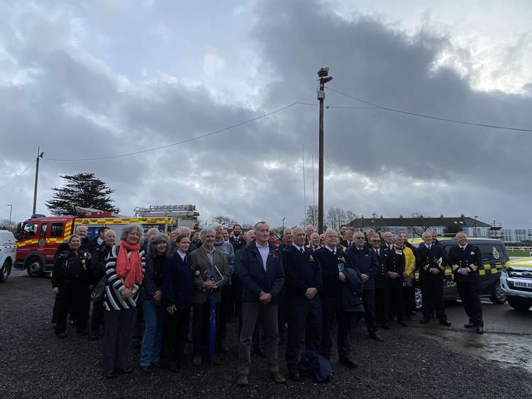 Coastguard past and present gather outside Falmouth Rugby Club.