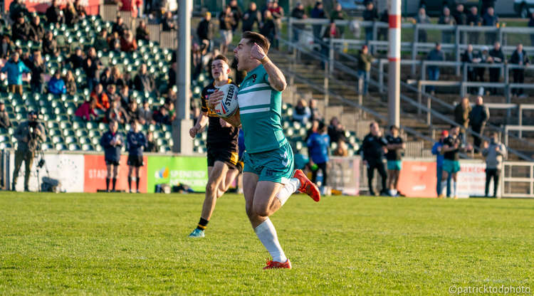 Harry Aaronson goes over to score. Photo credit: Patrick Tod.