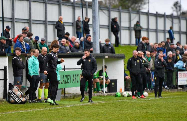Falmouth Town manager Andrew Westgarth deep in thought at St Blazey. Credit: Matt Friday/Cornwall Sports Media.