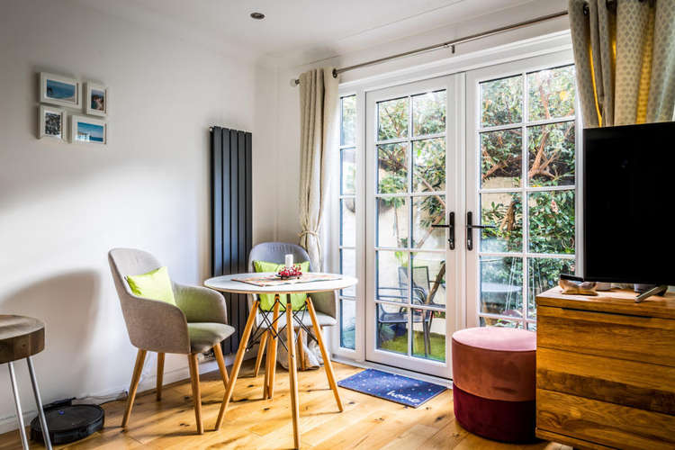 A sunny spot in the living room facing the French Doors to the garden (Image: Carringtons)