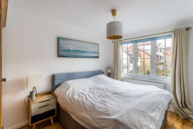 The light and airy main double bedroom (Image: Carringtons)