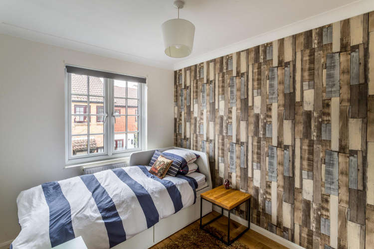 The second bedroom with feature wall (Image: Carringtons)