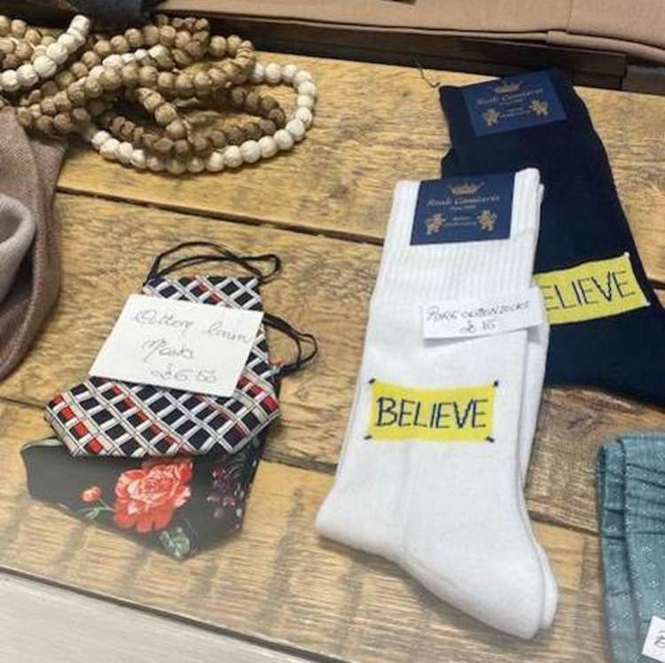 Socks are embroidered with Ted's favourite mantra 'BELIEVE'