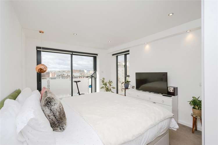 The light and airy main bedroom with views across Kingston waiting to be gazed at (Image: Rightmove)