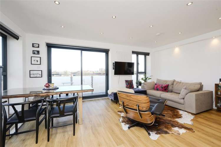 The Living/Dining room with French Doors to the balcony (Image: Rightmove)