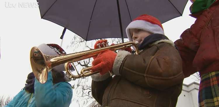 Nelson has been fundraising for charity over Christmas by playing the trumpet outside hospitals (Credit: ITV)