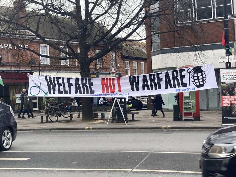 A banner from the protest in Twickenham reads "Welfare not Warfare"