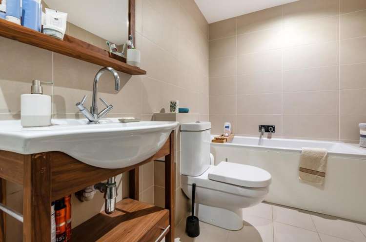 Bathrooms in the house have a sleek modern design (Image: Gibson Lane)