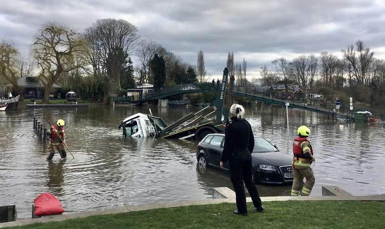 Firefighters with the LFB helped secure the truck so it didn't sink further into the river (Image: Ruth Wadey)