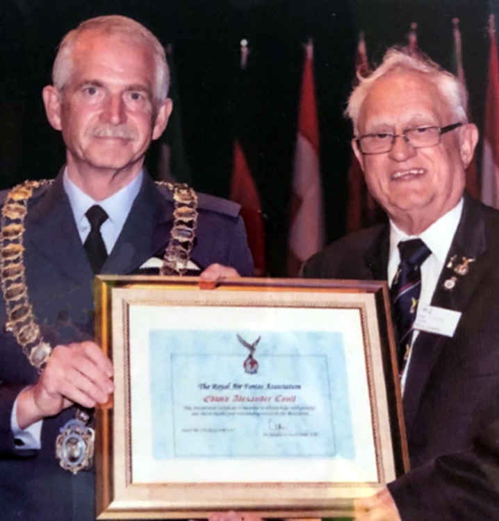 Top Honour. Air Marshal Sir Dusty Miller presented Eddy Coull with his National Presidential Certificate.