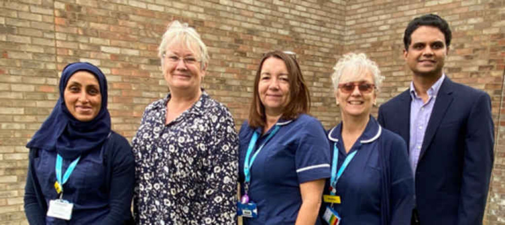 The Gastroenterology team, Jacqueline Roscoe, IBD nurse specialist (centre) and Dr Pushpakaran Munuswamy, Gastroenterology Department Lead (far right). Image taken pre-Covid.