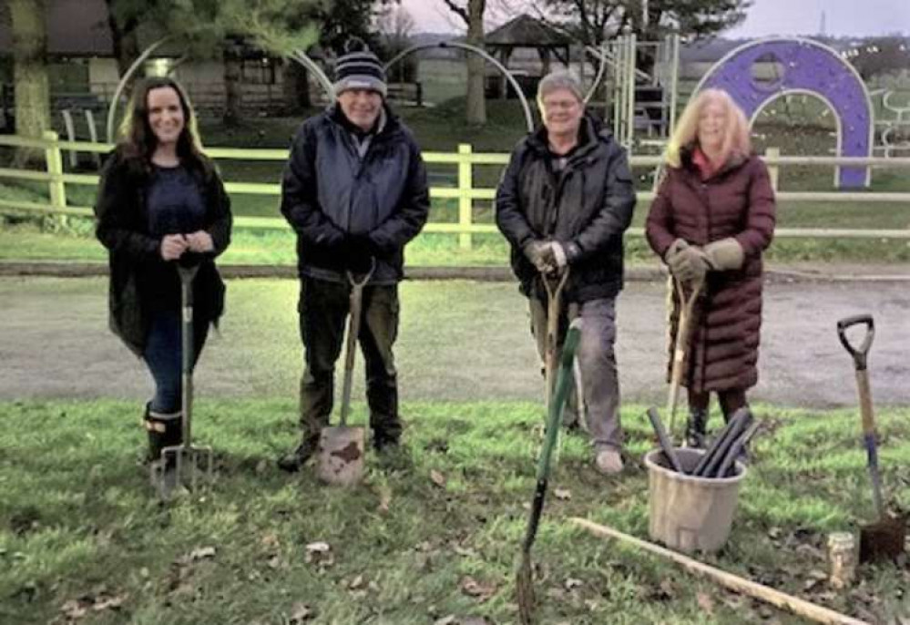 Rotary Club members planting trees throughout the community