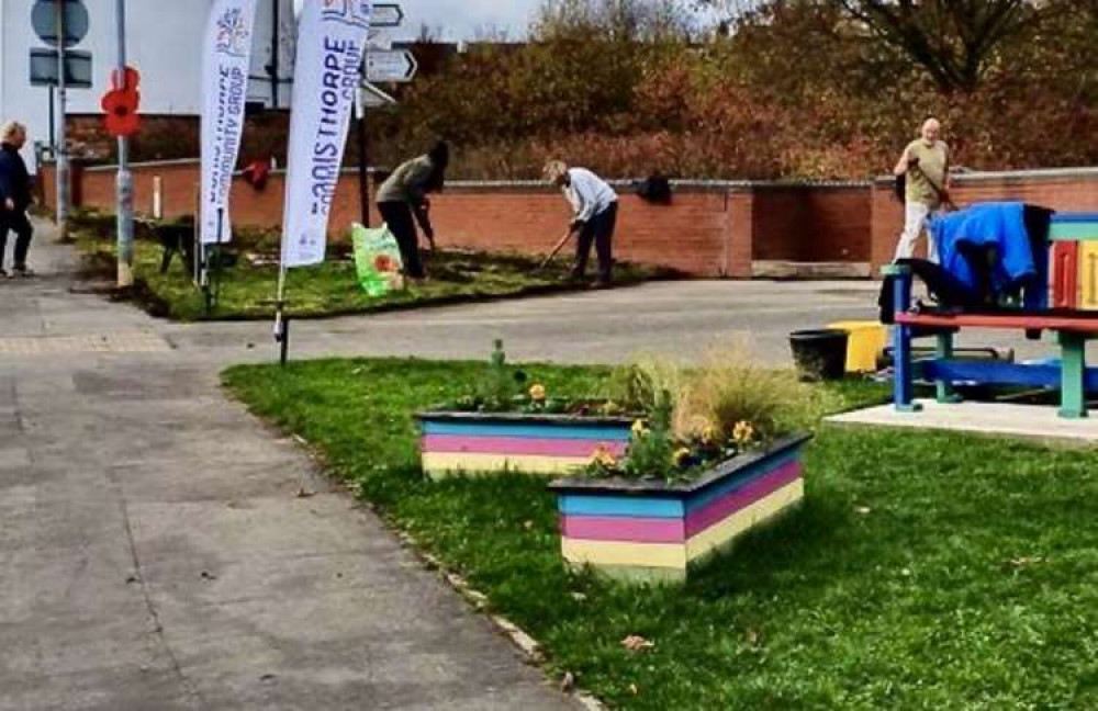 Residents at work on the latest stage of the scheme. Photo: Peter Gale