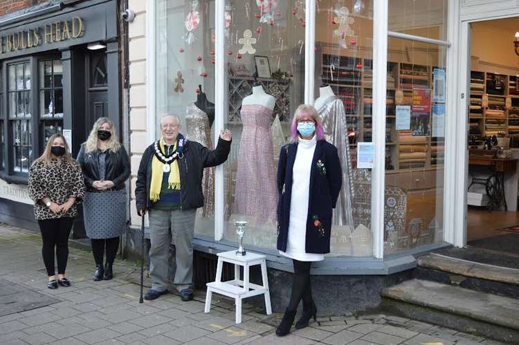 Abby Millward, Emma Clarke, Alison Smith MBE, with Cllr Graham Allman, former Mayor of Ashby, at last year's Best Dressed Window winners Sew Wardrobe in Market Street