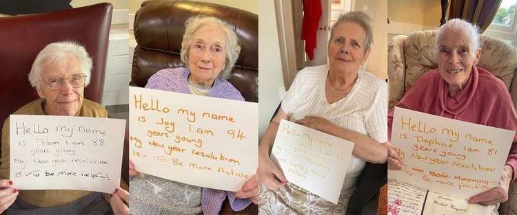 Four Ashby Court residents display their New Year's Resolution for 2020