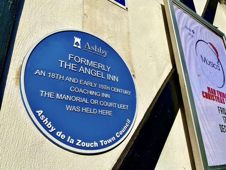 A blue plaque tells of the pub's history