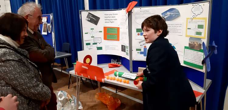 An Ivanhoe student explains his presentation to the Mayor of Ashby, Cllr Rita Manning