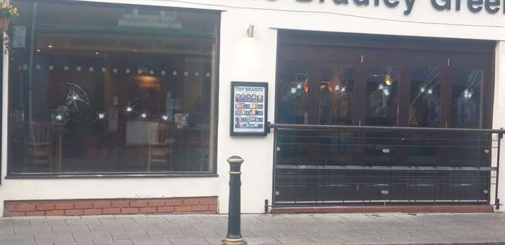 Several of the local pub's windows have been damaged. Image credit: Andy Dixon