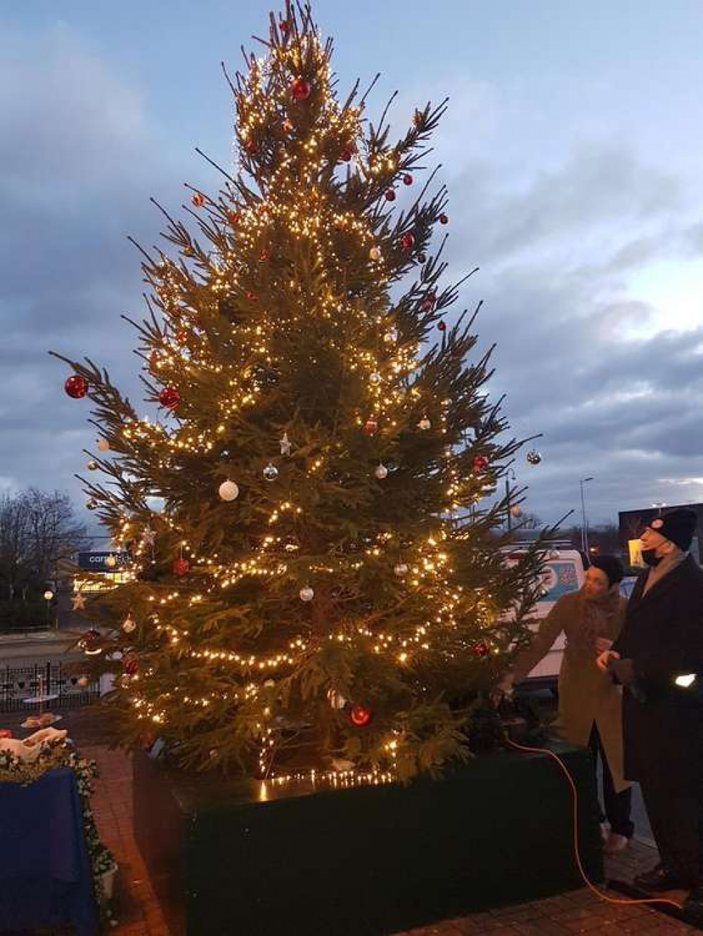 The Christmas tree lights were switched on by Brentford Councillor Mel Collins, right. (Image: Jim Storrar)