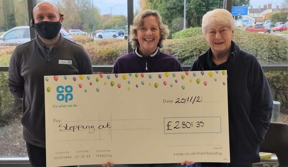 Stepping Out members Sheila Edwards and Rosemary Thorpe received a cheque for £2801.35 from Co-op Manager James, the funds raised by Bridport Co-op Community Fund