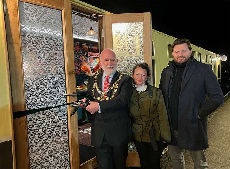 Bridport mayor, councillor Ian Bark, officially opens the new carriage, pictured with Claire and Ross Moore (Image: Neil Barnes)