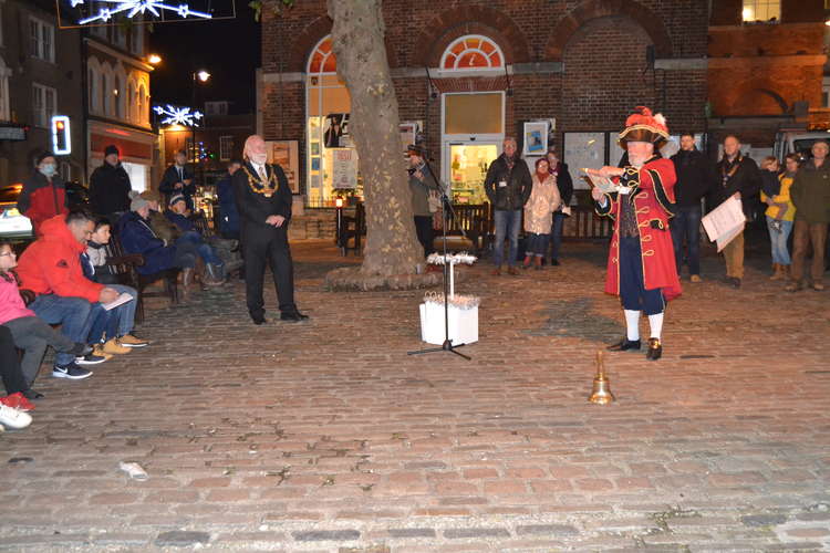 Bridport mayor, councillor Ian Bark, switches on the Christmas tree lights, pictured left with town crier John Collingwood