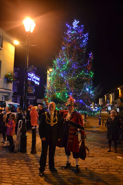 Bridport mayor, councillor Ian Bark, switches on the Christmas tree lights, pictured left with town crier John Collingwood