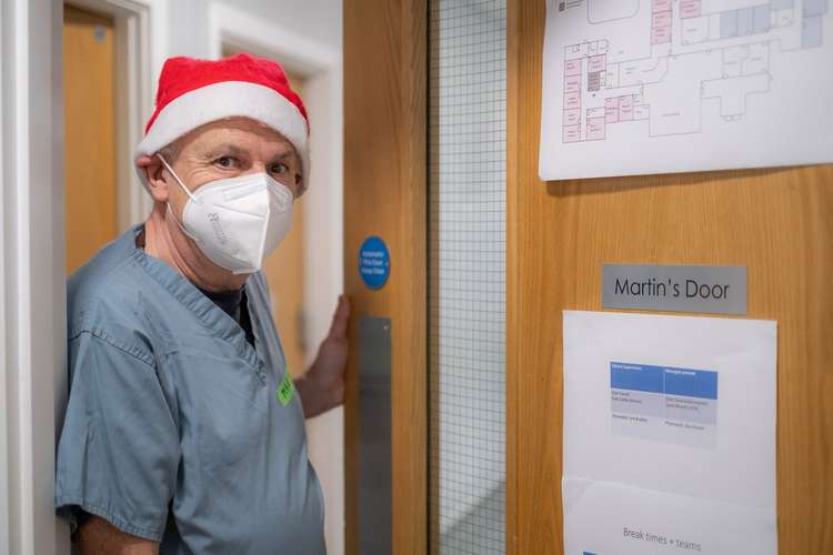 Photographer Eddy Pearce captures the first Covid booster vaccines at Bridport medical centre (Image: Eddy Pearce)