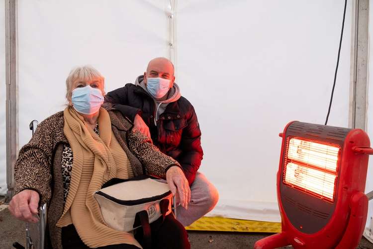 Photographer Eddy Pearce captures the first Covid booster vaccines at Bridport medical centre (Image: Eddy Pearce)