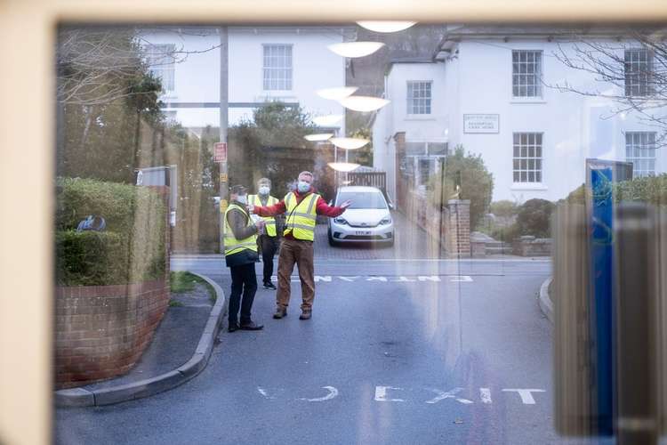 Photographer Eddy Pearce captures the first Covid booster vaccines at Bridport medical centre (Image: Eddy Pearce)